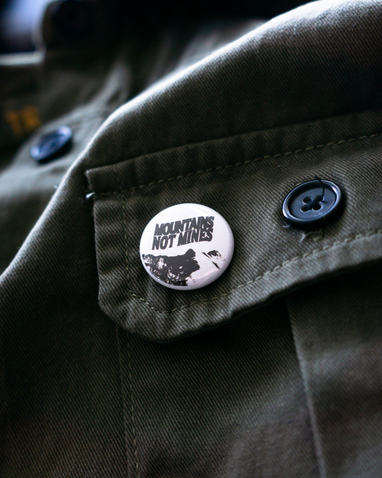 Adam Steel × Tigertail “Mountains Not Mines” Button